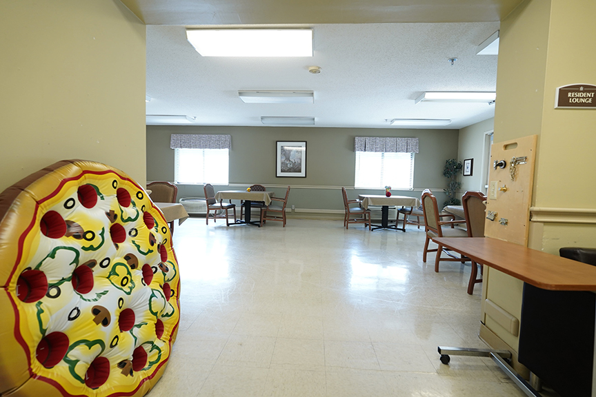 Inflatable pizza floater in Resident Lounge- Arbors at Delaware